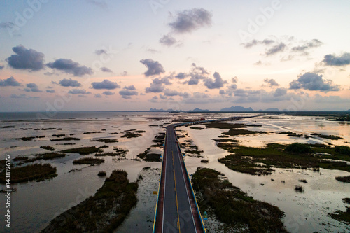Wallpaper Mural Aerial view Drone shot of Bridge(Ekachai bridge)Colorful Road bridge cross the lake at Talay Noi Lake in Phatthalung province Thailand Torontodigital.ca