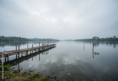 Wallpaper Mural A quiet riverside landscape under overcast skies with a rustic wooden pier, smooth waters, and distant tree reflections Generative AI Torontodigital.ca