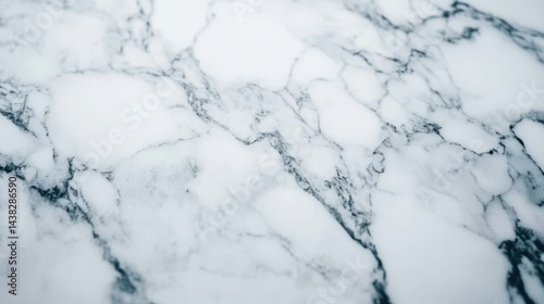 Closeup view of a white marble surface texture.