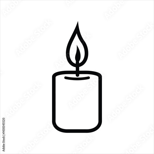 A candle with a flame is lit