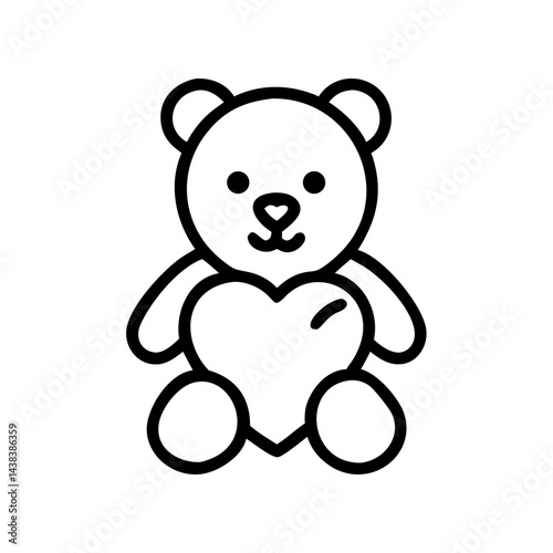 Cute teddy bear holding heart