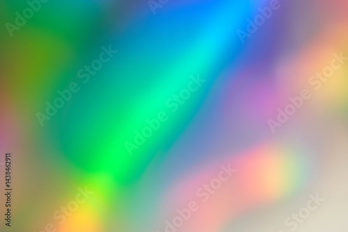 Vibrant colorful abstract holographic background with soft gradient blurs in neon shades.