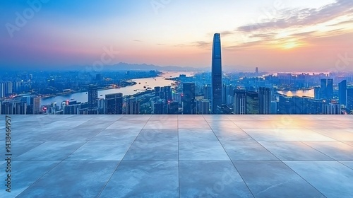 Panoramic cityscape at sunrise over city buildings and river