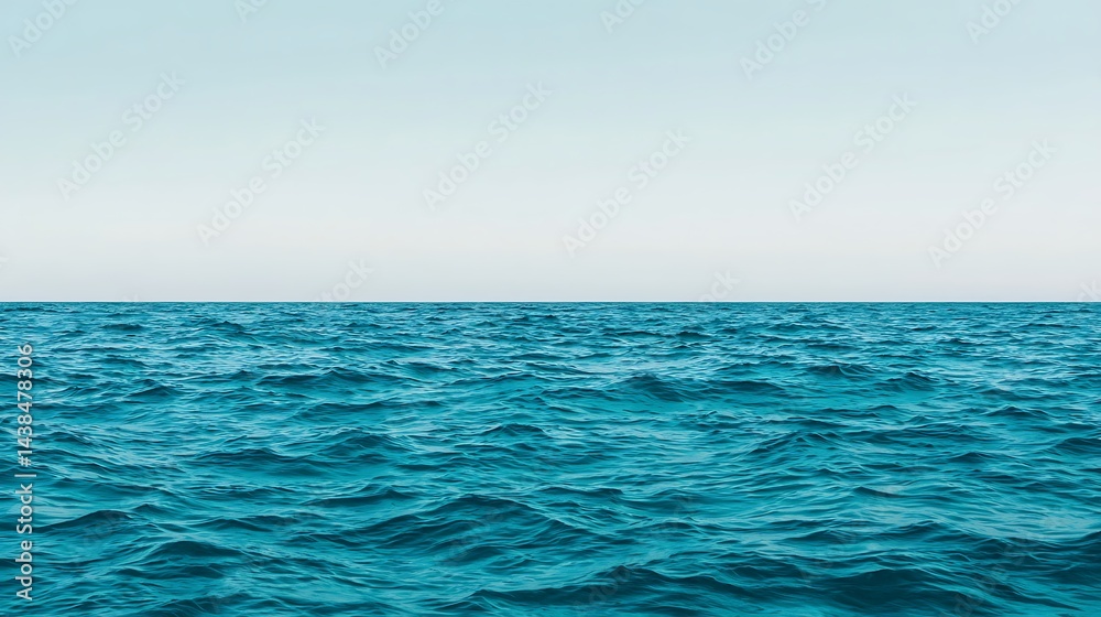 Fototapeta premium Vibrant Teal Water Waves Meeting Soft White Sky: A Serene Ocean View Landscape for Backgrounds and Design.