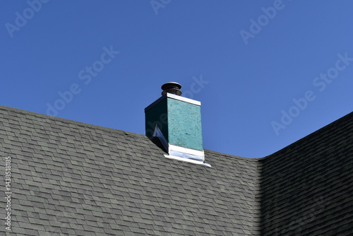 Nice roofline with green chimney.