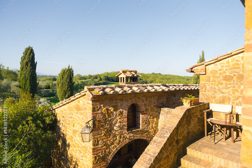 Tuscan architecture blends seamlessly with the landscape, offering a tranquil escape..