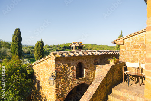 Obraz na płótnie Tuscan architecture blends seamlessly with the landscape, offering a tranquil escape.. w salonie