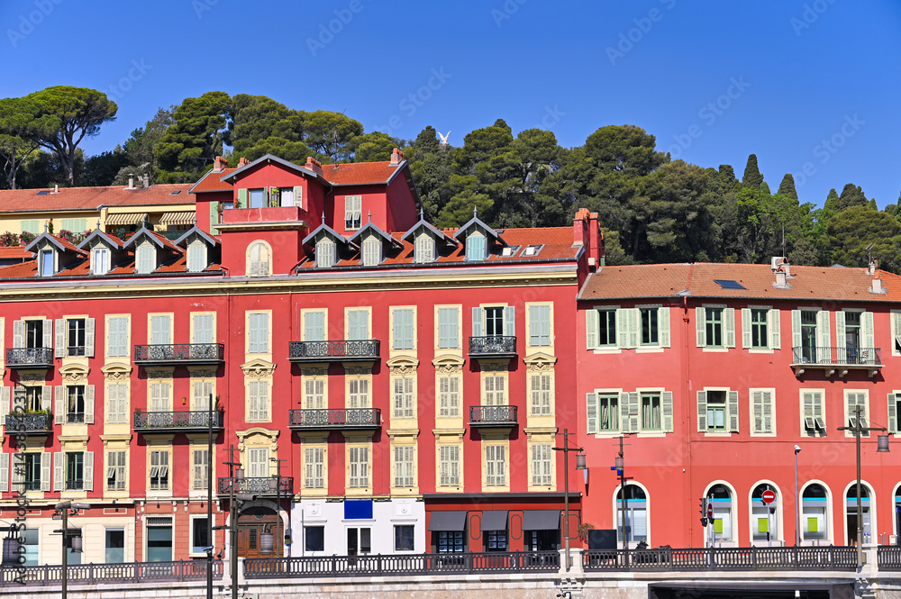 Fototapeta premium Old red buildings near port in Nice, France