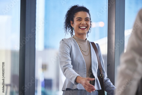 Obraz na płótnie Business people, welcome and woman with handshake, agreement and greeting in airport lobby. Person, employee and travel agent with confidence, shaking hands and gesture for thank you and b2b deal w salonie