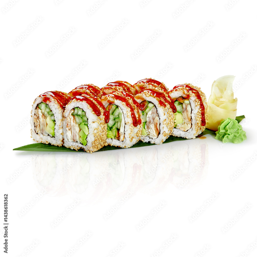Delicious sushi rolls with eel, avocado, cucumber, sesame seeds, and spicy sauce on banana leaf