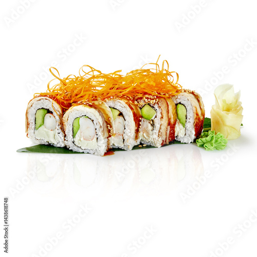 Obraz na płótnie Dragon roll sushi with eel, shrimp, avocado, cream cheese, and sesame seeds displayed on banana leaf w salonie