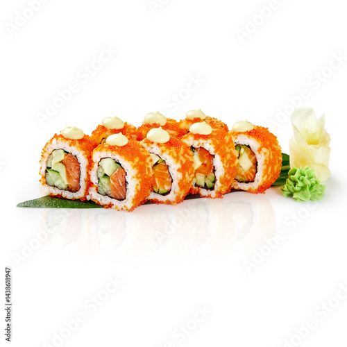 Obraz na płótnie California roll covered in tobiko with salmon, avocado and cucumber filling resting on a bamboo leaf w salonie