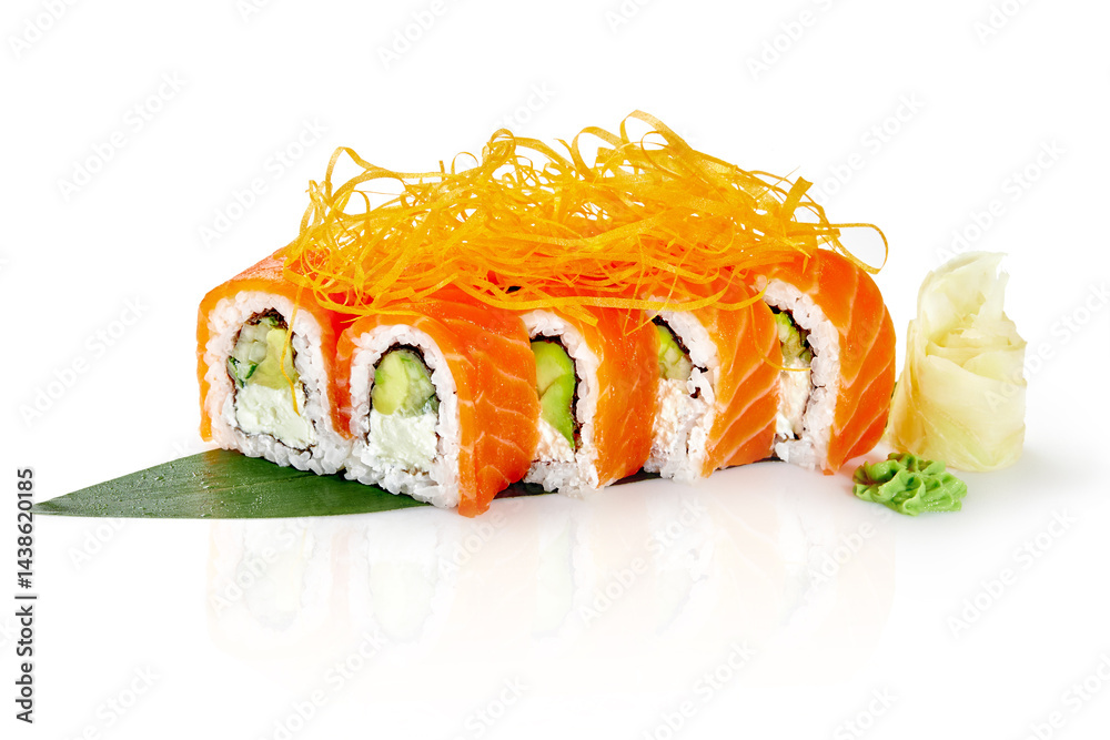Philadelphia uramaki sushi rolls with salmon, avocado, cream cheese and crispy onions on white background