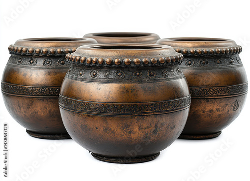 high-quality image of four ancient bronze kettledrums with ornate designs isolated on a white background