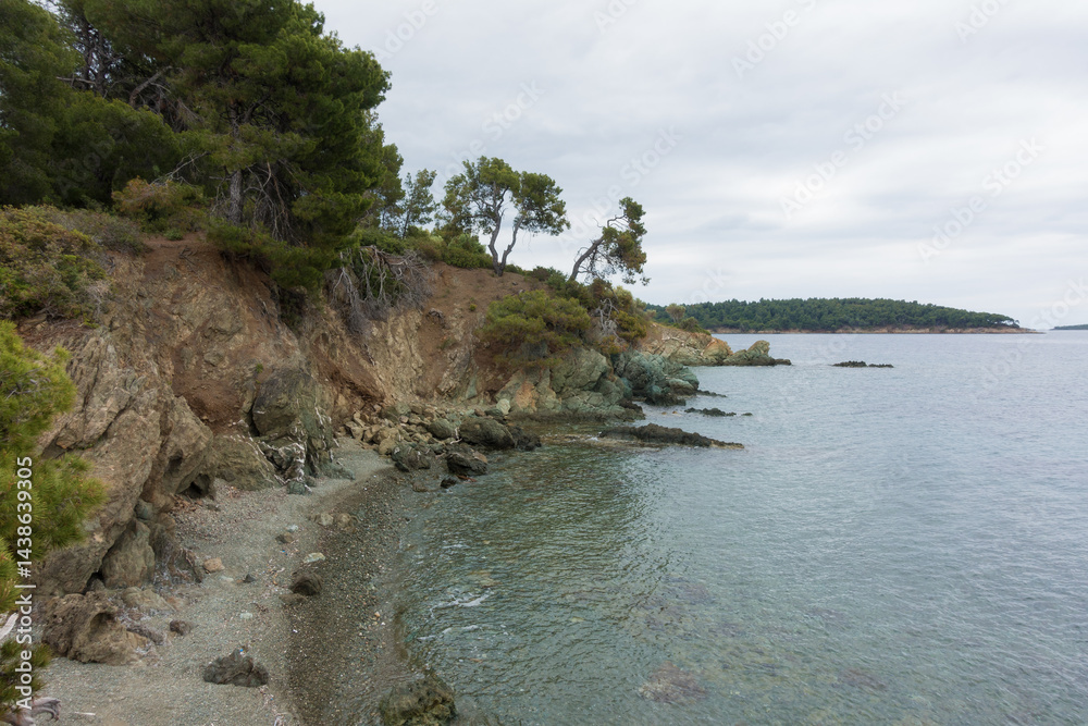 Beautiful scenery by the sea under a cloudy sky in Sithonia, Chalkidiki, Greece