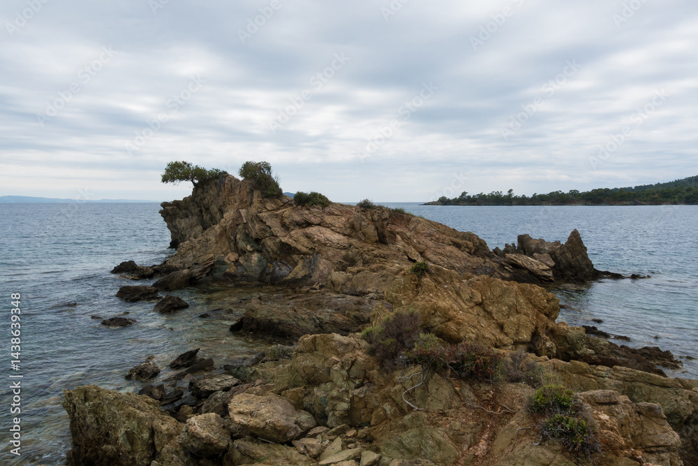 Beautiful scenery by the sea under a cloudy sky in Sithonia, Chalkidiki, Greece