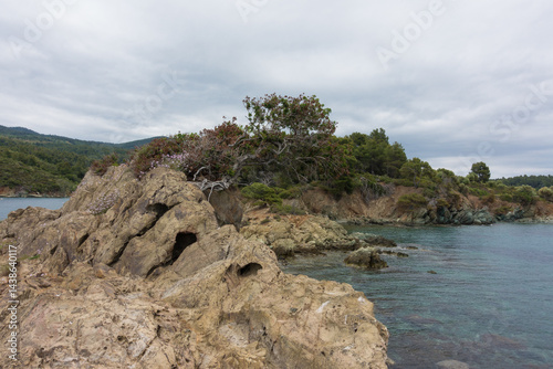 Beautiful scenery by the sea under a cloudy sky in Sithonia, Chalkidiki, Greece