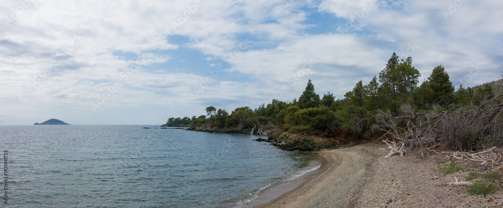 Beautiful scenery by the sea under a cloudy sky in Sithonia, Chalkidiki, Greece