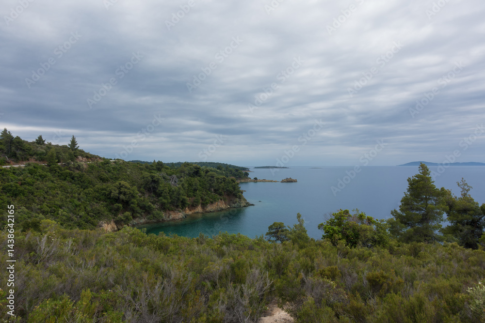 Beautiful scenery by the sea under a cloudy sky in Sithonia, Chalkidiki, Greece