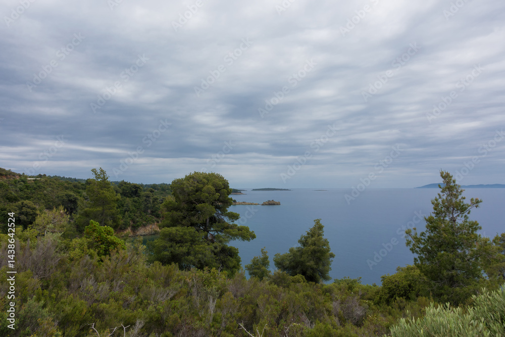 Beautiful scenery by the sea under a cloudy sky in Sithonia, Chalkidiki, Greece