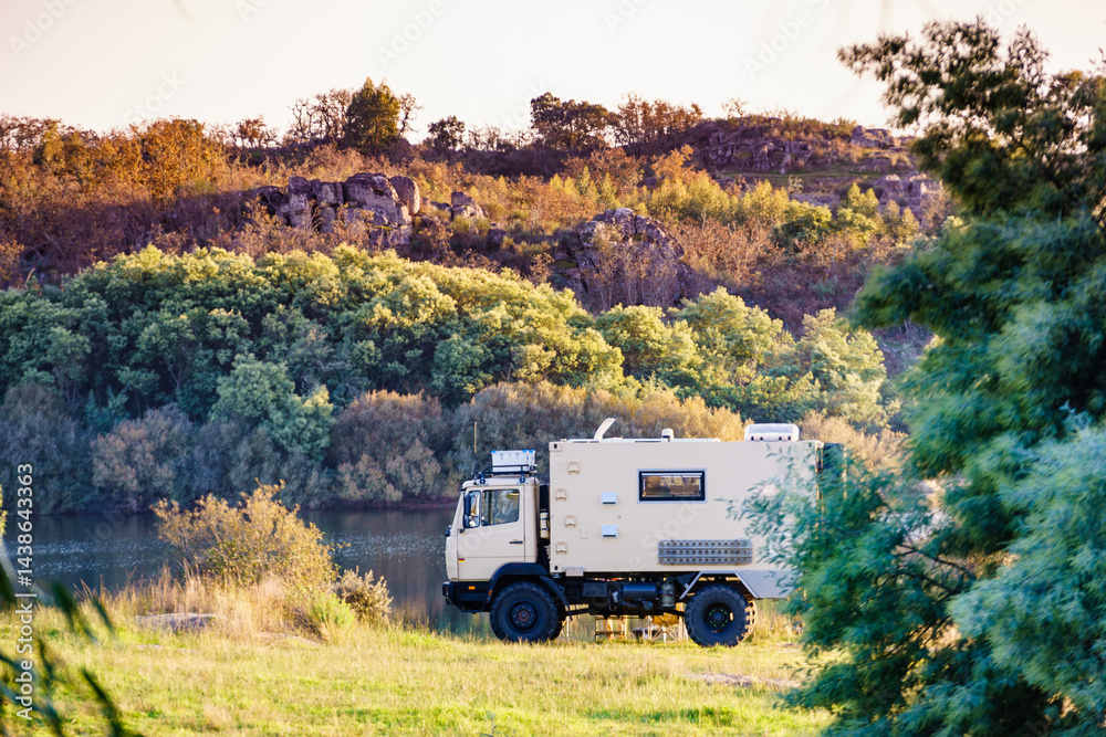 Offroad camper 4x4 truck on nature
