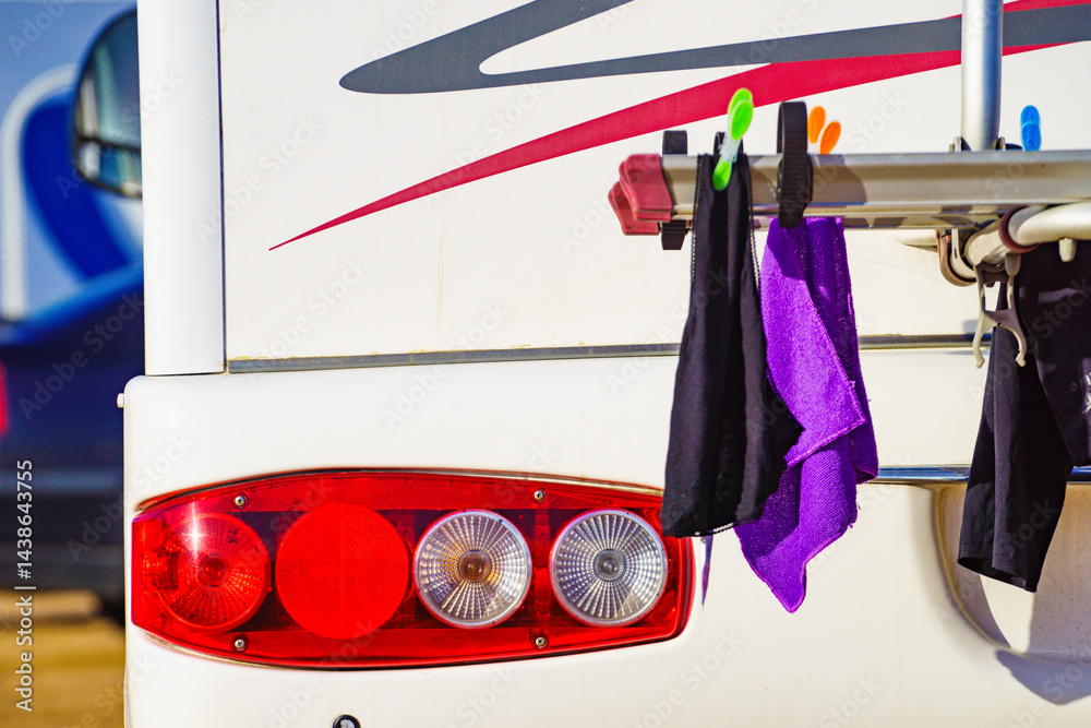 Caravan with clothes to dry on back rack