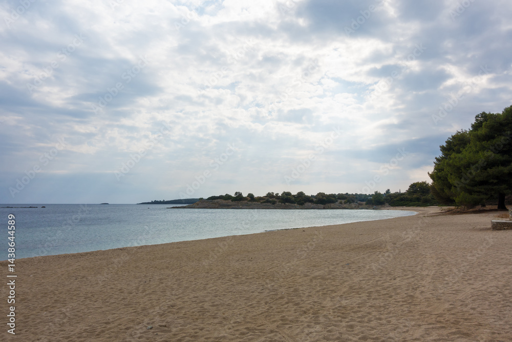 Beautiful scenery by the sea under a cloudy sky in Sithonia, Chalkidiki, Greece