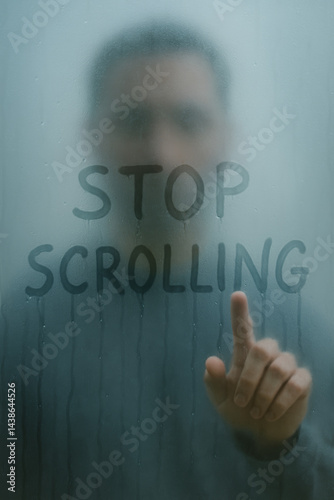 man tracing the words 