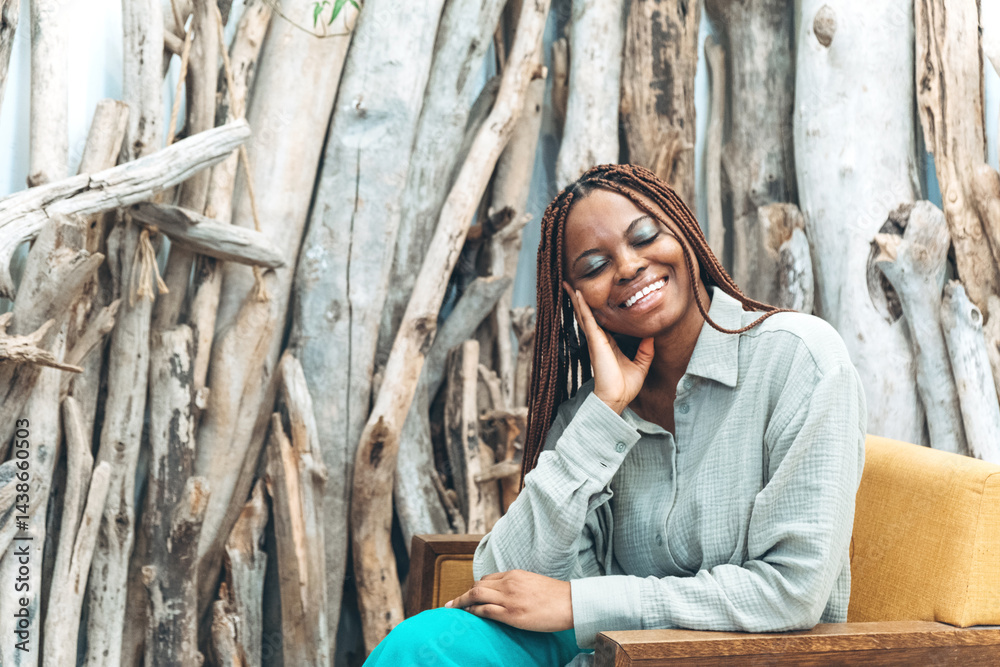 A smiling woman is relaxing in a beautiful natural environment on a magnificent background