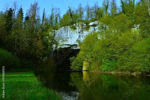 Obraz na płótnie Rak river flowing under the big natural bridge karst rock formation in Rakov škocjan, Notranjska, Slovenia w salonie