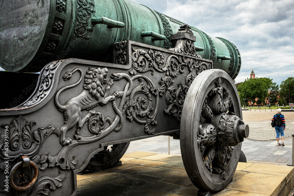 Tsar Cannon (King of Cannons) with luxury decoration in Moscow Kremlin, Russia. It is old famous tourist attraction of city. Large ornate bronze gun, Pushka on Russian