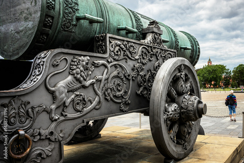 Tsar Cannon (King of Cannons) with luxury decoration in Moscow Kremlin, Russia. It is old famous tourist attraction of city. Large ornate bronze gun, Pushka on Russian