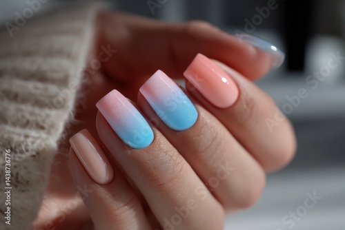 Wallpaper Mural Close-up of female hands with stylish manicure in pastel colors, showcasing a beautiful ombre effect and precise nail art on a sweater background, creating a soft and elegant look. Torontodigital.ca