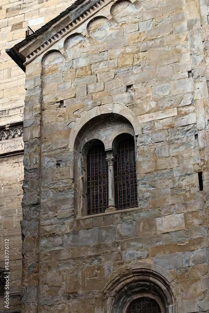 Obraz premium Charming view of the narrow cobblestone streets in Bergamo Alta, Italy. A historic old town with medieval architecture, scenic alleys, and a timeless atmosphere full of Italian character.