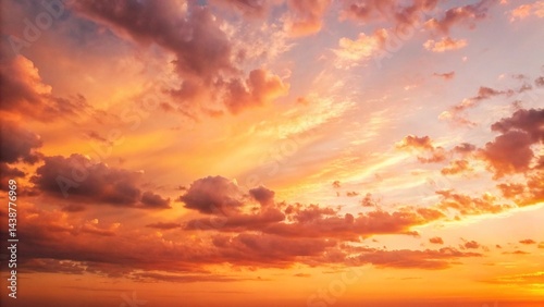 Colorful clouds at twilight: a stunning display of orange, pink, and purple in the sky.
