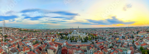 Photography Panoramic view of Istanbul's cityscape at sunset