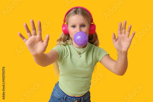 Cute trendy girl in headpho...