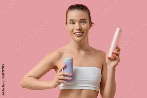 Pretty young woman with bot...