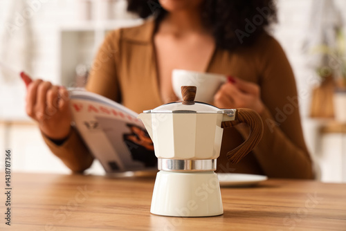 Young woman with cup of fre...