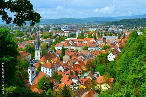 Obraz na płótnie View of the old town of Ljubljana with church towers and red roofs in Slovenia w salonie