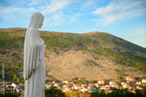 Tableau sur toile Statue of the Blessed Virgin Mary on Mount Podbrdo, the Apparition hill overlooking the village of Medjugorje in Bosnia and Herzegovina