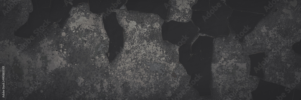 Dark wide panoramic background. Peeling paint on a concrete wall. Faded dark texture of old cracked flaking paint. Weathered rough painted surface with patterns of cracks. Shaded background for design