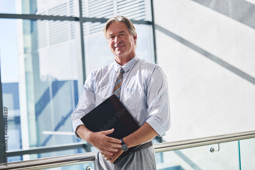 Fototapeta premium File, portrait and smile with business man in office for audit or tax review of financial documents. Accounting, finance and info with mature corporate employee in workplace for professional work