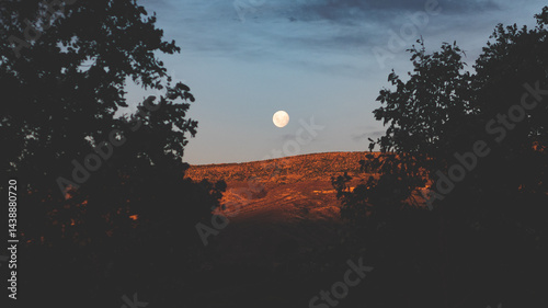 Beautiful sunrise and moonset on the hills in otago new zealand golden hour colours stunning