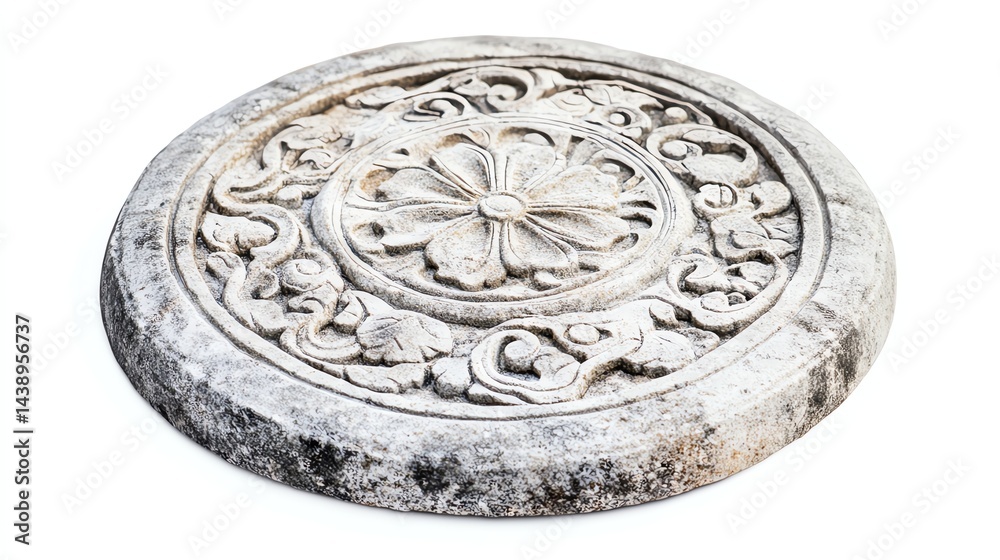 Fototapeta premium Ornate stone disc with intricate floral carvings, white isolated background.