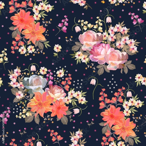 Embroidered bouquets and tiny flowers on a black background. Floral embroidery seamless pattern. Romantic print for fabric.