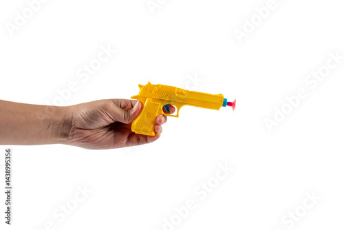 Plastic yellow toy gun shaped llike a real one on transparent background photo
