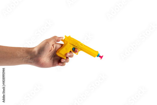 Plastic yellow toy gun shaped llike a real one on transparent background photo