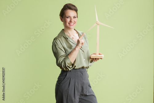 Enthusiastic woman promoting wind energy