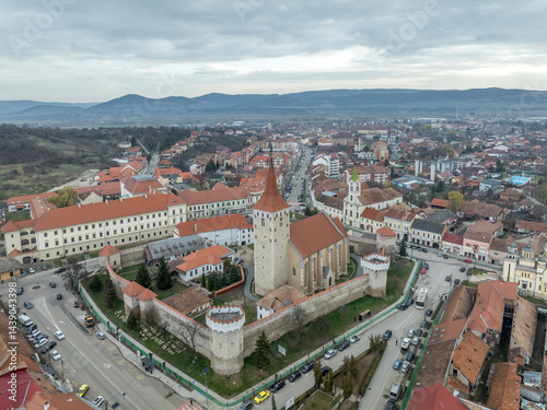 Obraz na płótnie Aerial view of Aiud Nagyenyed fortified protestant church in Romania with walls and towers in the middle of the town w salonie